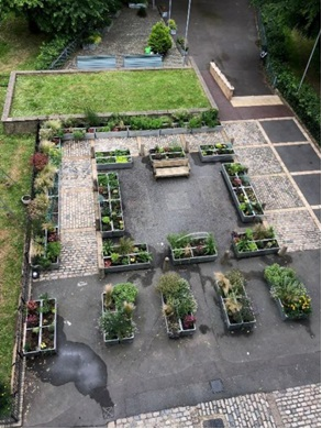 Aerial view of planters laid out in the communal area of the estate